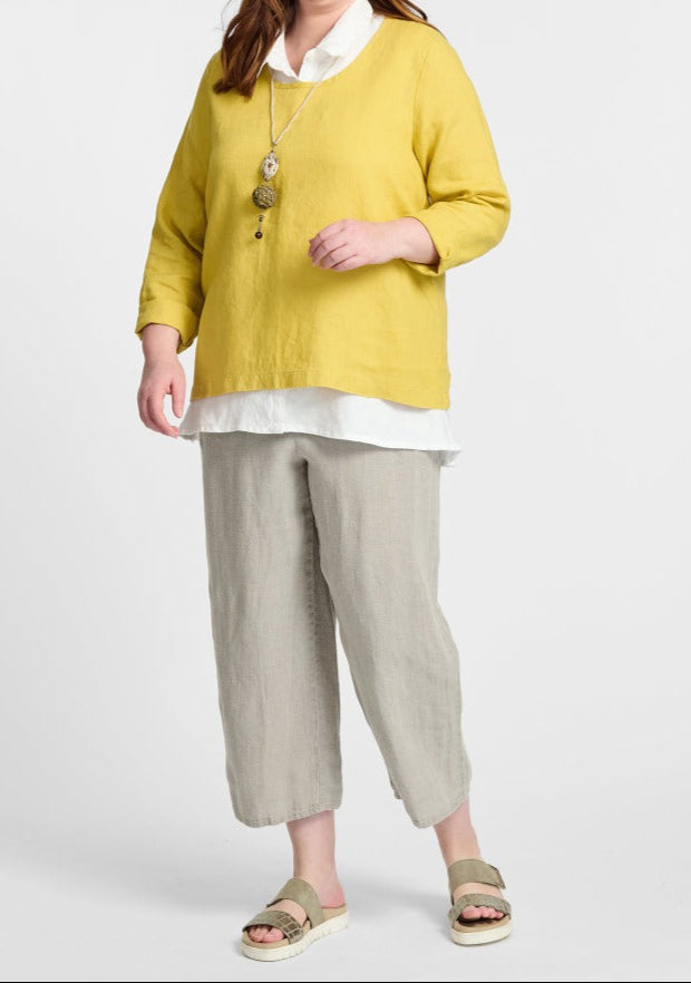 Pure Top (Goldenrod) layered over the sleeveless Skyline Blouse (White), paired with the Floods (Natural).  Model is 5'9" tall, wearing size Medium.