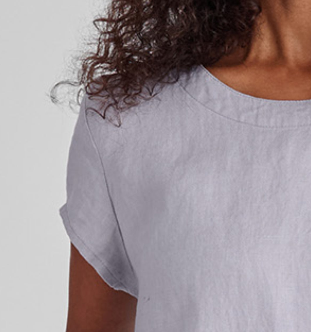 Tuck Back Dress, shown in Platinum. Zoomed in on the neckline and cap sleeve detail.