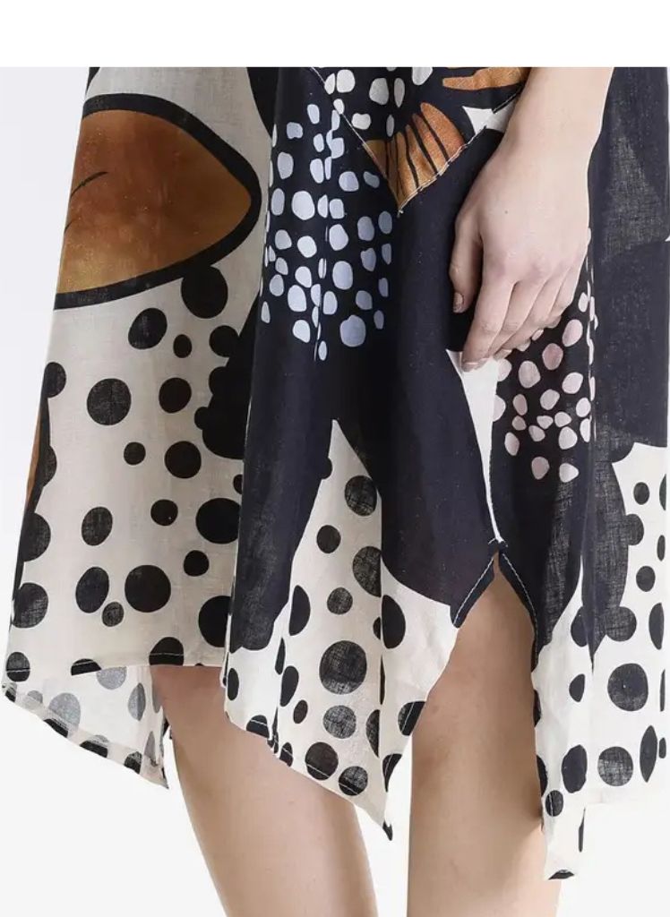 April Large Flower Dress, one size. Featuring the rounded hi-low hemline and side slit detailing. Model is approximately 5'9" tall.