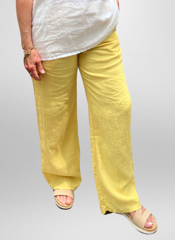 Flat Iron Pant, shown in Banana, size Small. Model is 5'6" tall. 100% Linen with a wide Cotton Knit drawstring waistband.