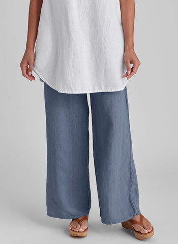 Flat Iron Pant, shown in Cadet Blue, size Small.  Model is 5'9" tall.  100% Linen with a wide Cotton Knit drawstring waistband.