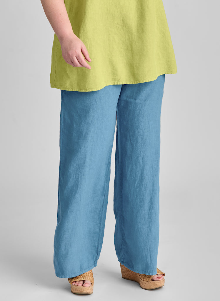 Flat Iron Pant, shown in Caribbean, size Medium. Model is 5'9" tall.