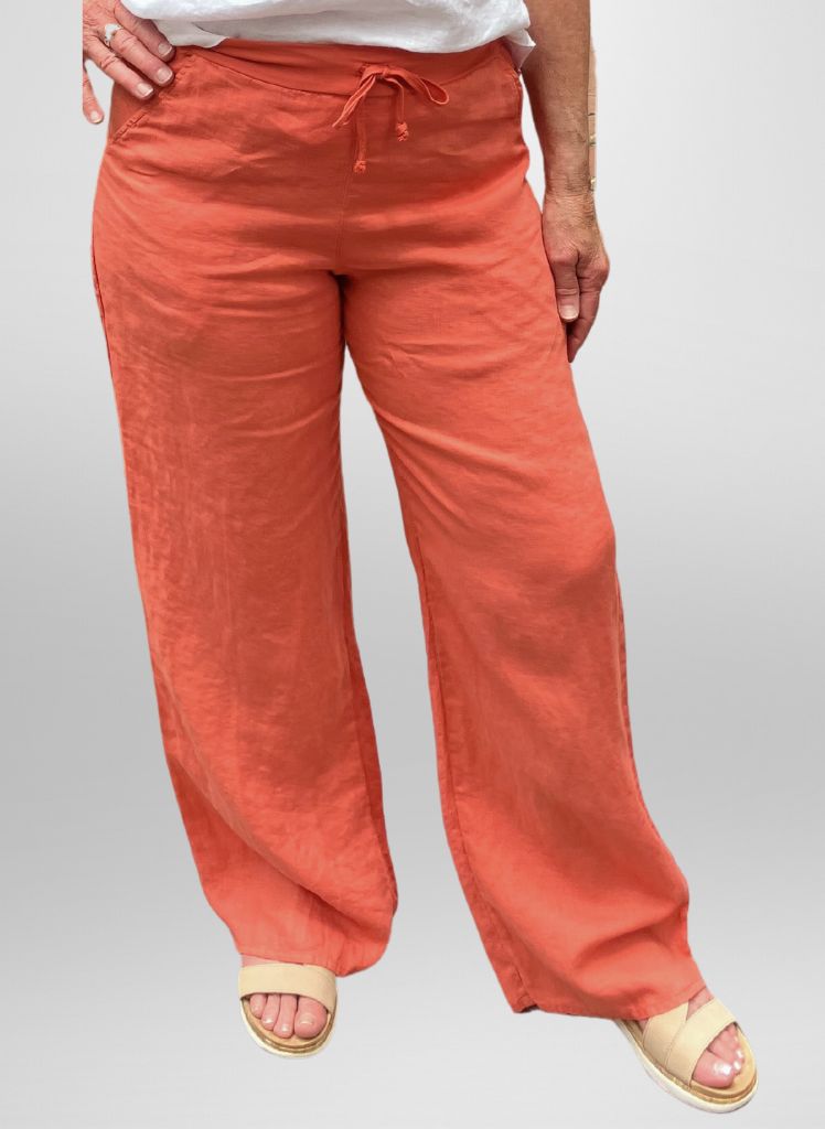 Flat Iron Pant, shown in Mango, size Small. Model is 5'6" tall. 100% Linen with a wide Cotton Knit drawstring waistband.