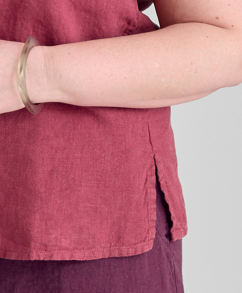 Fundamental Tank, shown in Cranberry.  Featuring side slit detail.
