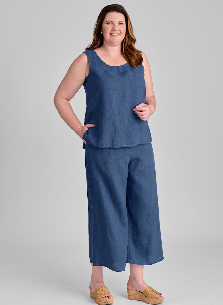Fundamental Tank paired with the wide-leg Sociable Floods (both shown in Ocean) for a monochromatic look.  100% European Linen, pre-shrunk, machine washable.  Model is 5'9" tall, wearing size Medium.