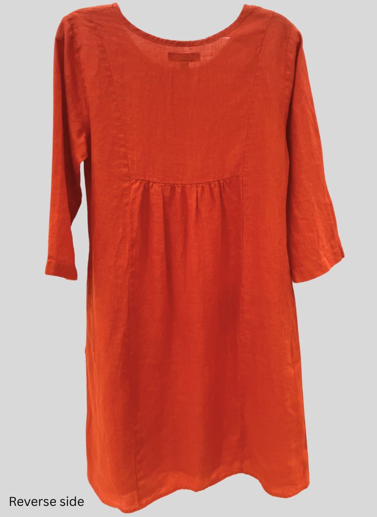 Happy Gather's Dress, shown in Koi, on the reverse side. Featuring vertical seams and gathered detail.