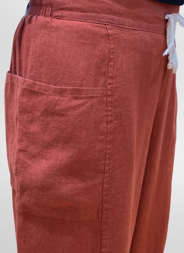 Keen Pant, shown in Spice.  Zoom on waistband, pocket, and seam detail.