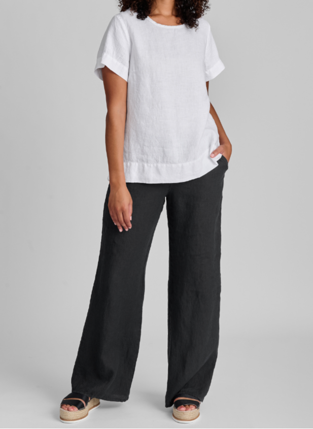 Roadie Tee (White) paired with the Flat Iron Pant (Faded Black), size Small.  Model is 5'9" tall.