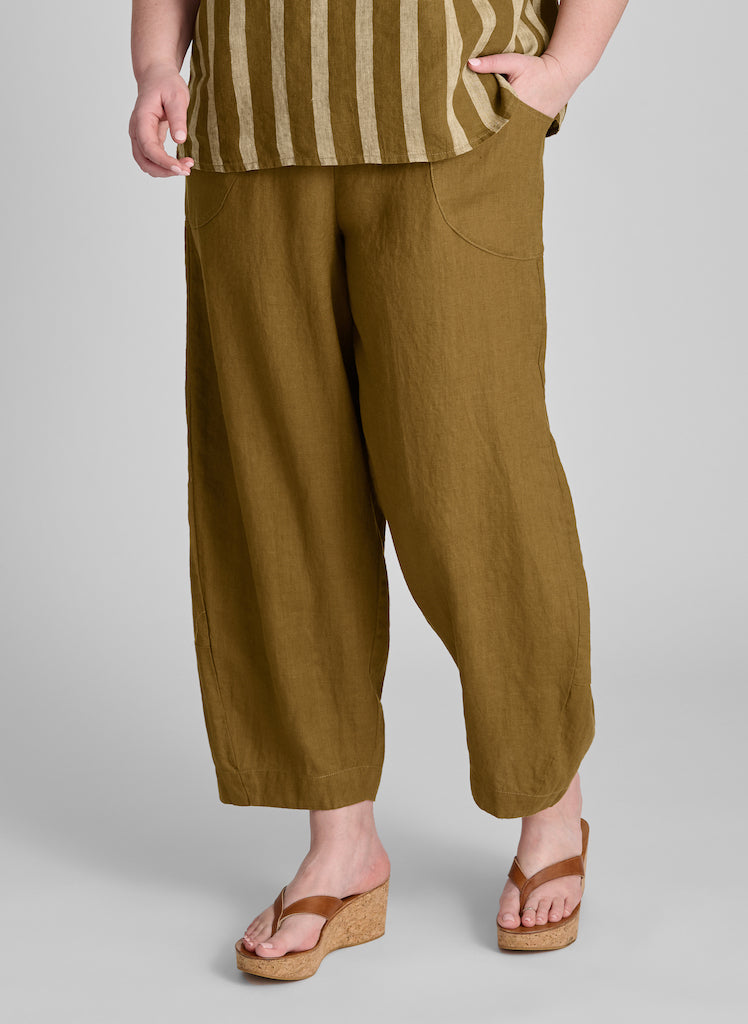 Seamly Pant, shown in Tobacco, size Medium.  Model is 5'9" tall.