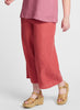 Sociable Flood, shown in solid Red Currant.  Model is 5'9" tall, wearing size Medium.