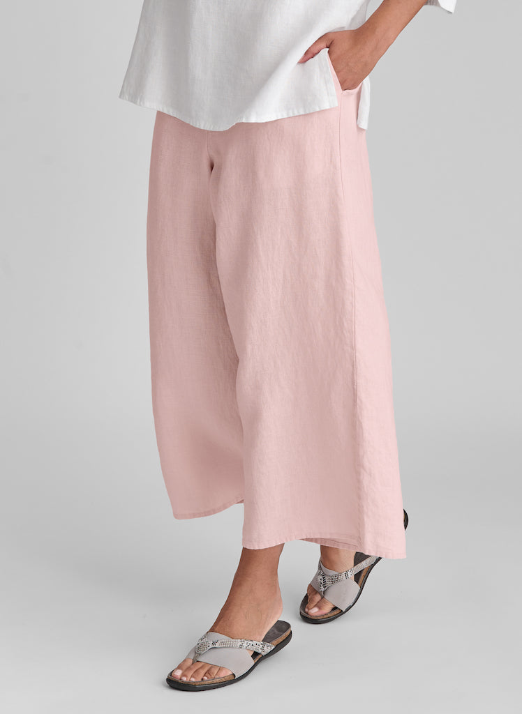 Sociable Floods, shown in Shell (light peachy pink), size Small. Model is 5'9" tall. 100% European Linen.