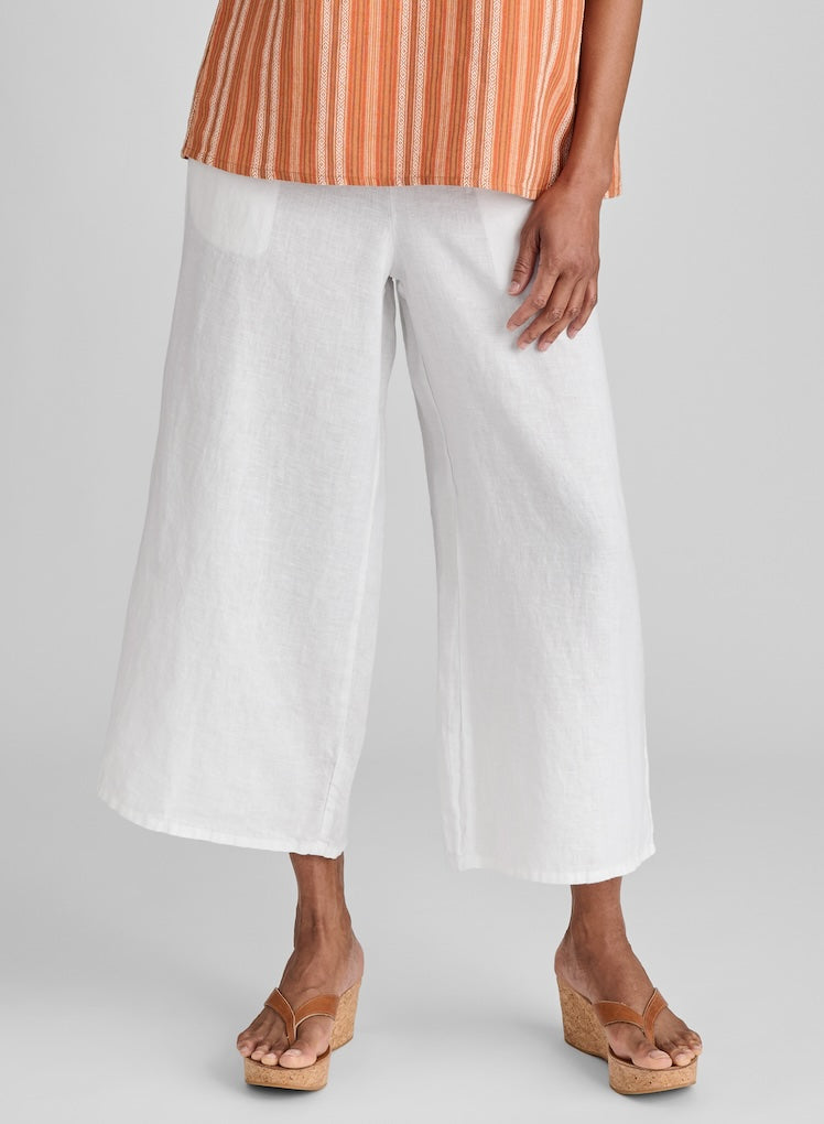 Sociable Floods, shown in White, size Small. Model is 5'9" tall. 100% European Linen, Preshrunk, Machine Washable.