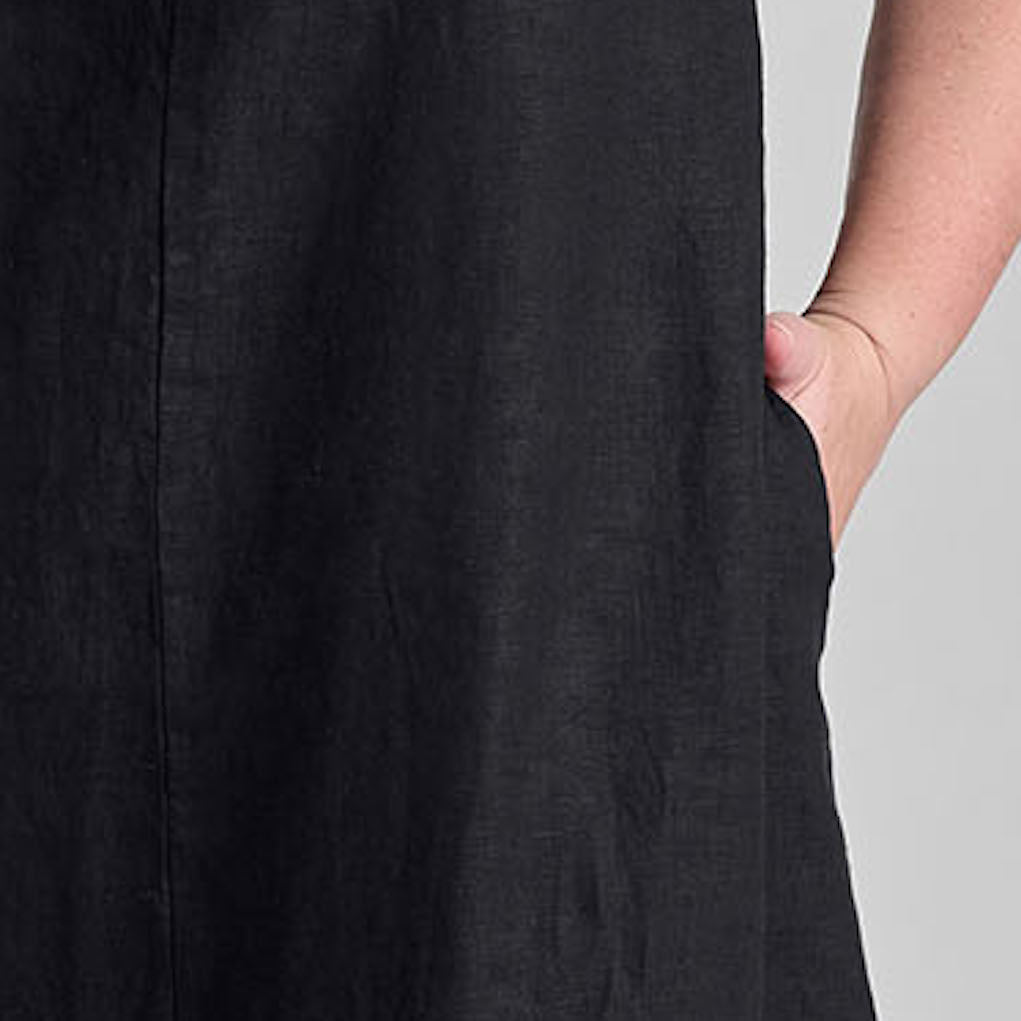 True Dress, shown in Black. Zoom on center seam detail and hidden side pocket that lands on the hip.