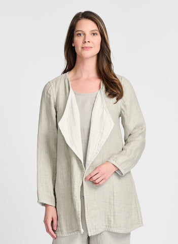 Encore Jacket (shown in Chai Lava, 100% Linen Gauze) layered over the Fundamental Tank in Natural. Model is 5'9" tall, wearing size Small. FLAX En-Core 2023.