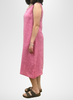 Jewel Dress, shown on the side profile, in Magenta Yarn Dye.  Model is 5'5" tall, wearing size Small.