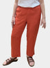 Travel Pant, shown in Orange, size Small.  Model is approximately 5'4”tall.