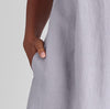 Tuck Back Dress, shown in Platinum.  Zoomed in on the side seam pocket detail, which lands on the hip.