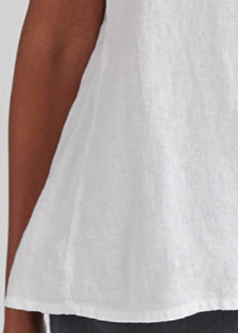 Weightless Tee, shown in White.  Zoomed in on the side panel detail, which gives you a smoother side and a slight flare to the shape.