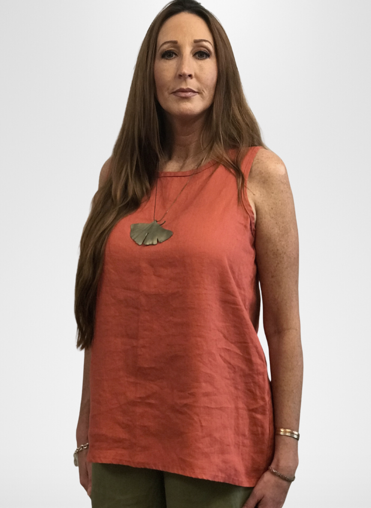 Layer Tank, shown in solid Red Currant. Lola (store employee) is modeling this top in size Small.