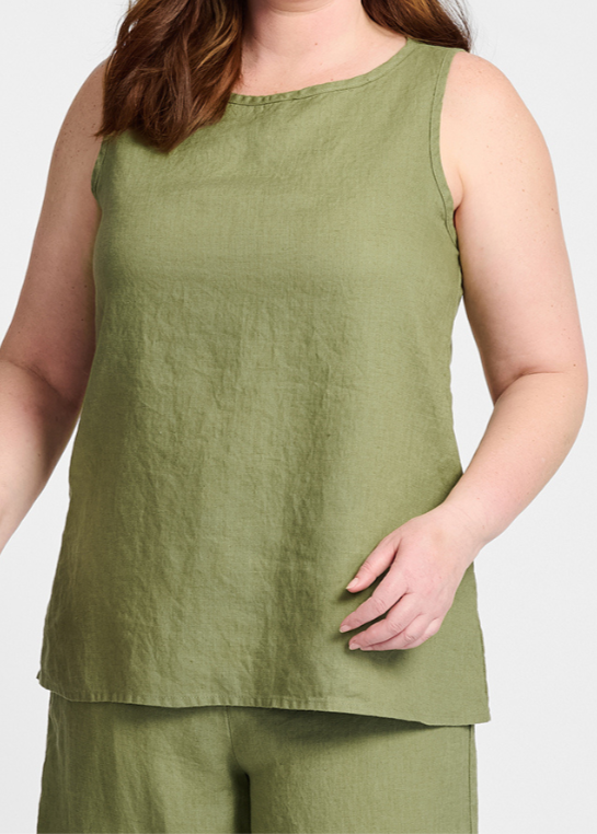 Layer Tank, shown in solid Rosemary. Model is wearing size Medium