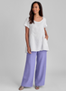 S/S Play in It (top, shown in White) paired with the Picnic Pant (shown in Iris).  Model is 5’9” tall, wearing size Small.  100% European Linen.