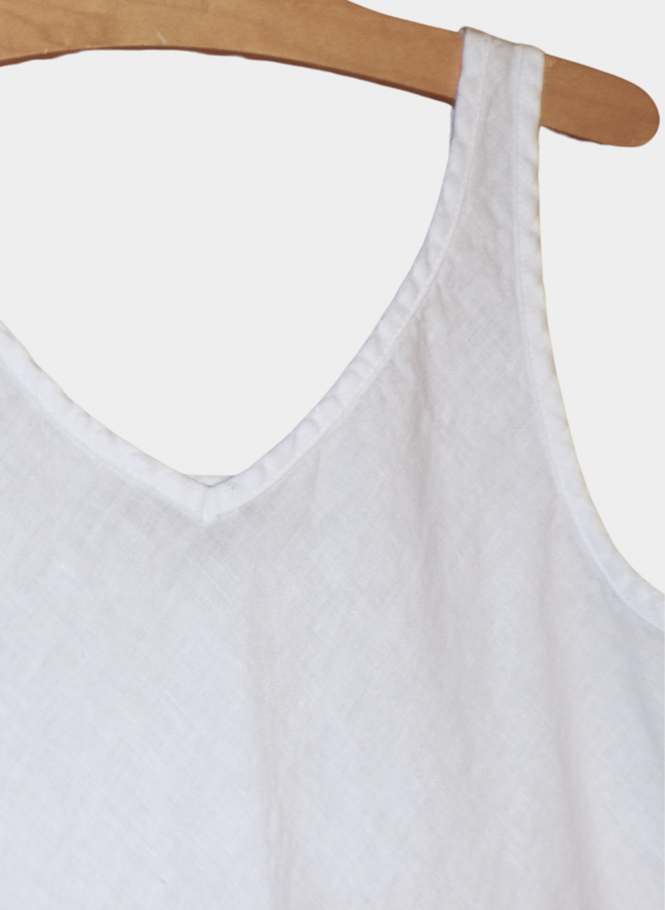 Two way Bias tunic, shown in White.  Zoom on Neckline, shoulder strap, and armhole detail.  100% European Linen, Machine Washable.