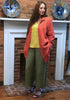 Afternoon Cover (in Red Currant) layered over the Pure Top (in Goldenrod) paired with the Sociable Floods (Rosemary).  Lola, one of our staff members, is 5'9" tall, wearing size Small.