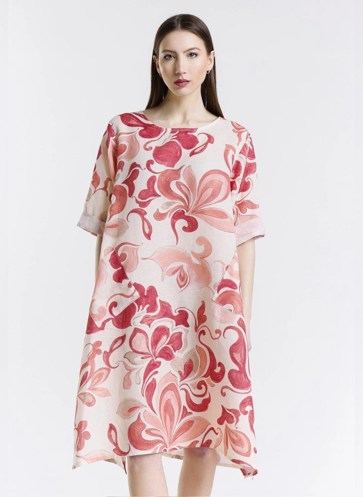 April Fleur Dress, shown in Coral, on the front.  One size,  Model is approximately 5'9" tall.  100% Linen, Made in Italy.