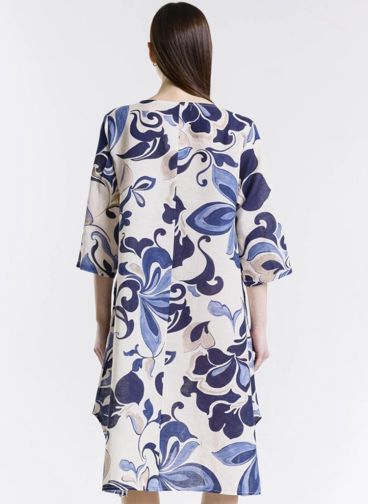April Fleur Dress, shown in Navy, on the back.  One size,  Model is approximately 5'9" tall.  100% Linen, Made in Italy.