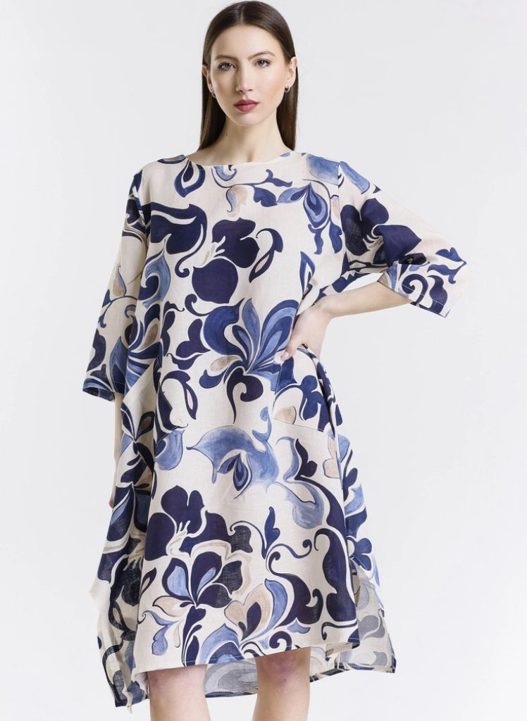 April Fleur Dress, shown in Navy, on the front.  One size,  Model is approximately 5'9" tall.  100% Linen, Made in Italy.
