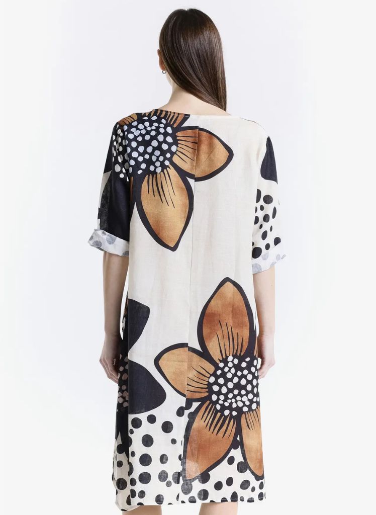 April Large Flower Dress, shown in Black/Brown, on the back.  One size, Model is approximately 5'9" tall.  100% Linen, Made in Italy.