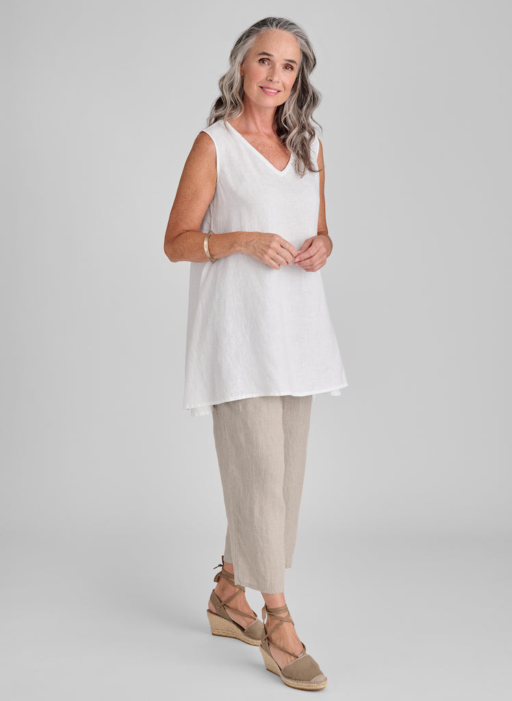 Artistic Tunic (White) paired with the Pocketed Ankle Pant (Natural).  Model is 5'9" tall, wearing size Small.  100% European Linen, pre-shrunk, machine washable.