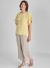 Back Slit Tee (Citrine Yarn Dye) paired with Floods (Natural).  Model is 5'9" tall, wearing size Small.  100% European Linen.