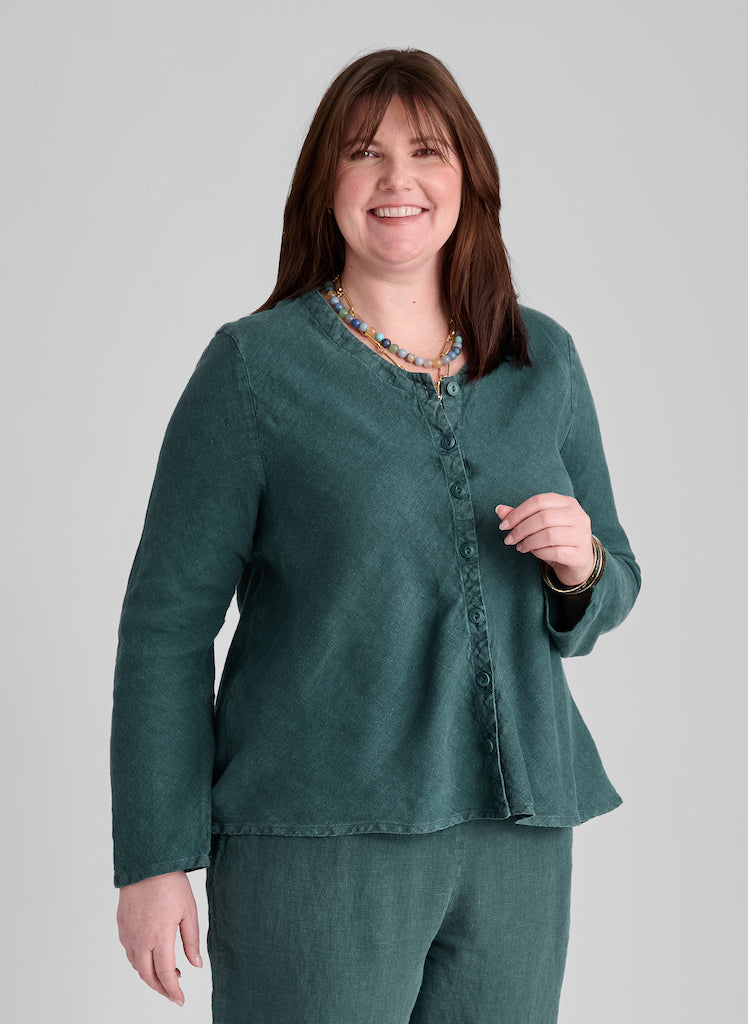 Beneficial Blouse, shown in Evergreen, size Medium.  Worn buttoned, as a blouse.  Cut on the bias, for a more contoured fit.