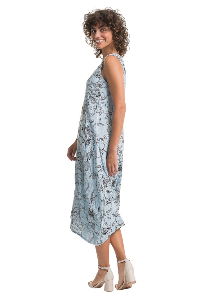 Bubble Dress, ciel blue.  Featuring the side profile and pocket detail.  Model is 5'9" wearing size Small.  100% European Linen.