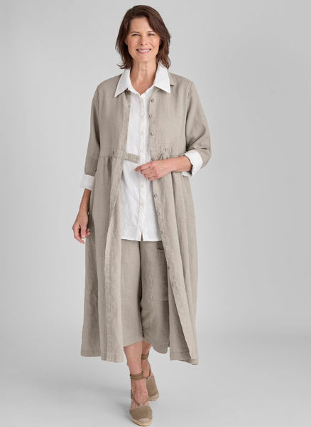 Button Down Dress shown in Natural, size Small.   Worn open, layered over the Bias Back Shirt  (in White) and the classic Floods (in Natural).  100% European Linen.
