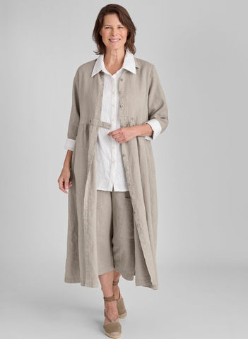 Button Down Dress shown in Natural, size Small.   Worn open, layered over the Bias Back Shirt  (in White) and the classic Floods (in Natural).  100% European Linen.