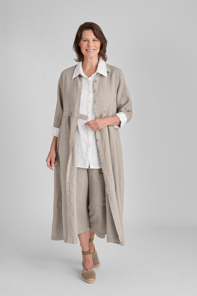 Button Down Dress shown in Natural, size Small.   Worn open, layered over the Bias Back Shirt  (in White) and the classic Floods (in Natural).  100% European Linen.