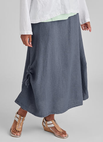 Cinch Skirt, shown in Slate (blue-grey), size Small.  Model is 5’9” tall.