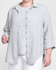 Crossroads Blouse, shown in Mist (light grey), size Medium.  Worn open, layered over the Tee Top.