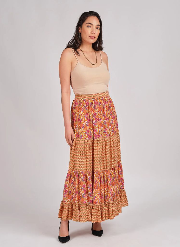 Daisy Print Skirt, shown in Peach (one size). Note:  Solid nude tank (not available) but shown as an outfit idea.