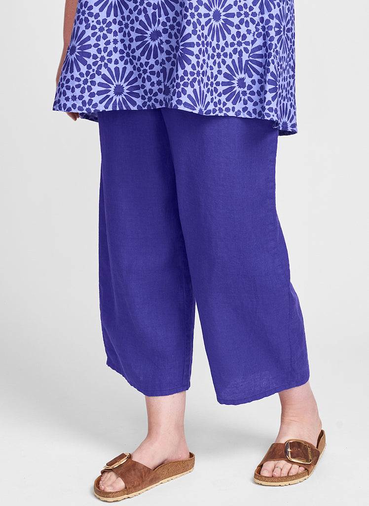 Floods, shown in Viola (purple), 100% Linen.  Model is 5'9" tall, wearing size Medium.