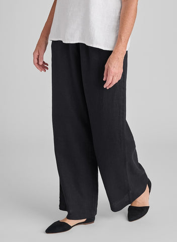 Flowing Pant, shown in Black, size Small.  Model is 5'9" tall.  100% Linen, elastic waist, 2 side pockets.