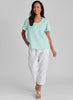 Fundamental Tee (Mint) paired with classic Floods (White).  Model is 5'9" tall, wearing size Small.  100% European Linen.