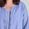 Gotcha Blouse, shown in Periwinkle, size Medium.  Close-up of the neckline and shoulder detail.