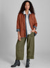 Graceful Jacket (Spice) layered over the Whole Shirt (slate), the Cherished Shirt (N/A in this color), and the Keen Pant (Herb).  Model is 5'9" tall, wearing size Small.  100% European Linen, Medium weight.