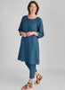 Happy Gathers Dress layered over the Tapered Pant, both shown in Dark Teal.  Model is 5'9" wearing size Small.