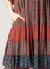 Laxmi Dress, shown in Raspberry (Multicolor) print. Features a single side seam pocket (on the right hip), horizontal ruffle detail on the bottom half.