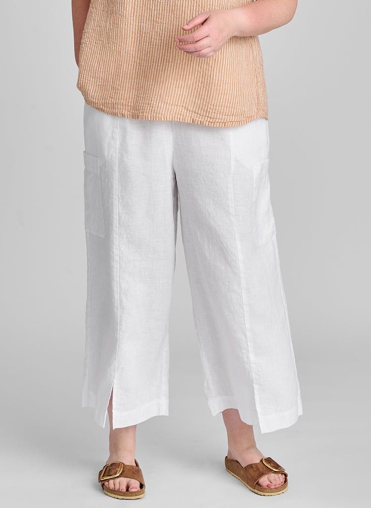 Modern Floods, shown in solid White.  Model is 5'9" tall, wearing size Medium.  100% European Linen.