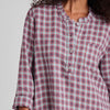 Nightshirt, shown in Plaid, size Small.  Zoom image features henley-style neckline with mandarin collar and 4 button placket, along with a single chest pocket, relaxed fit, and long roomy sleeves that are shown rolled up.  100% Handkerchief-weight European Linen.